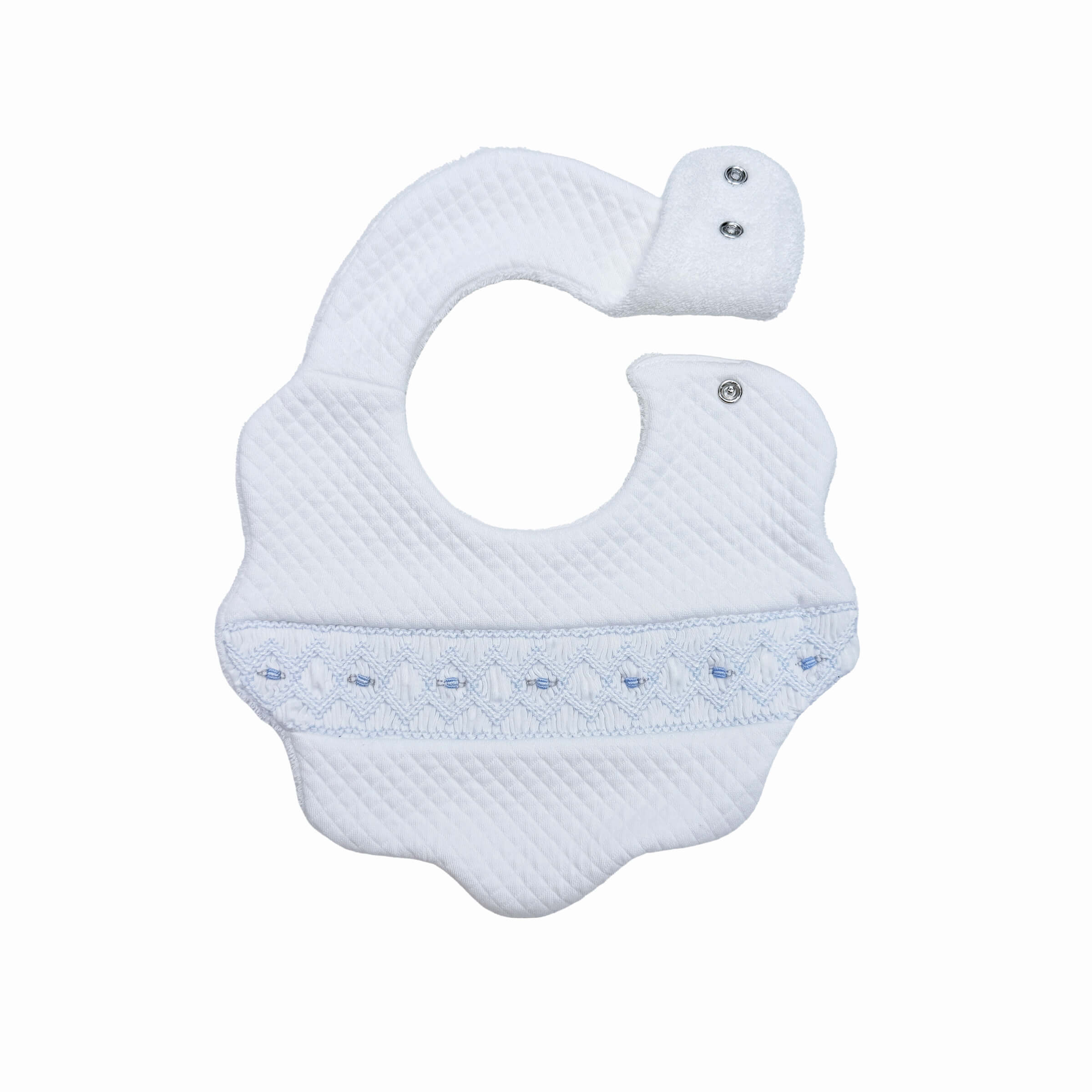 Quilted couture bib with matching smocked detail