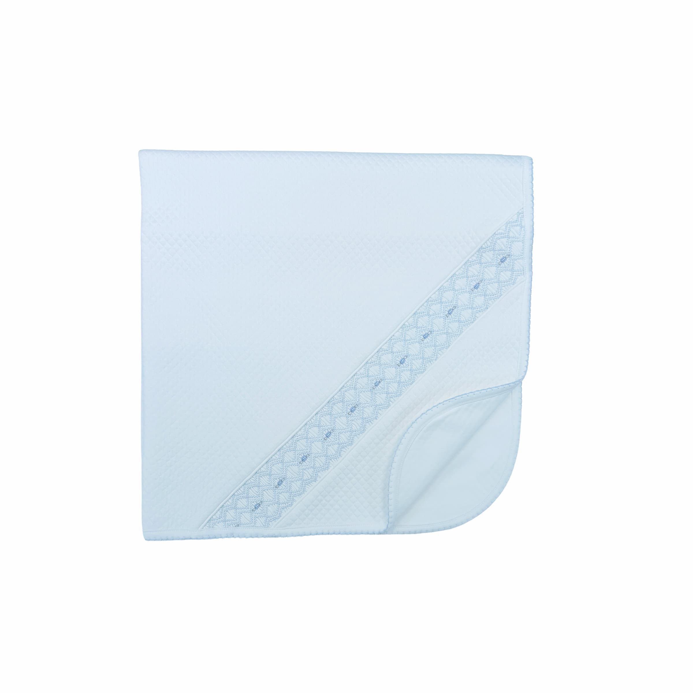 Soft quilted couture baby blanket with smooth interior lining - inside view.