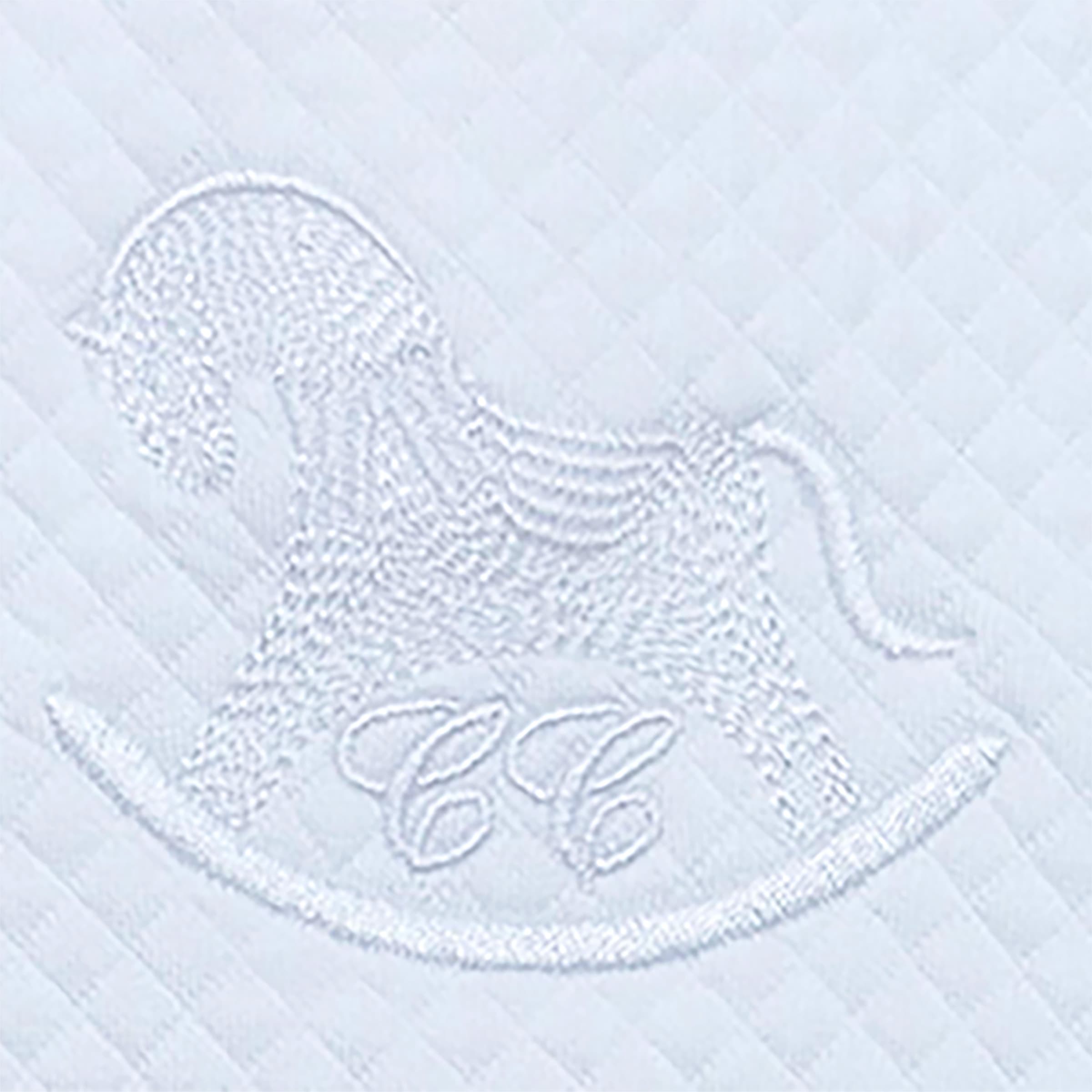 Close up detail of Cheris Chic rocking horse embroidery on luxury babywear.