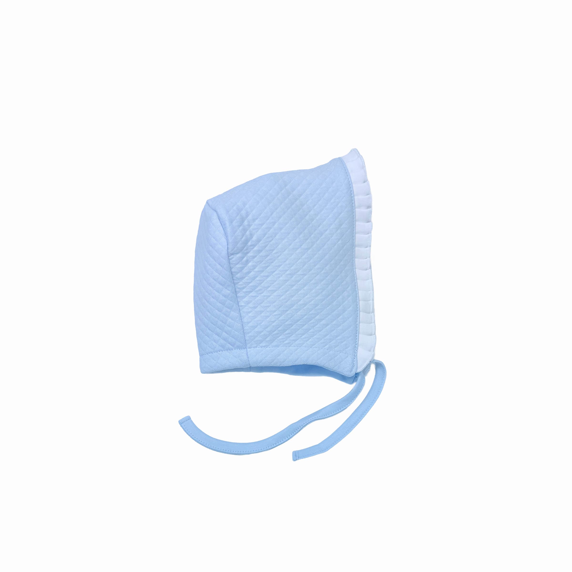 Blue baby bonnet with volant frill trim in luxury textured cotton weave – front view.