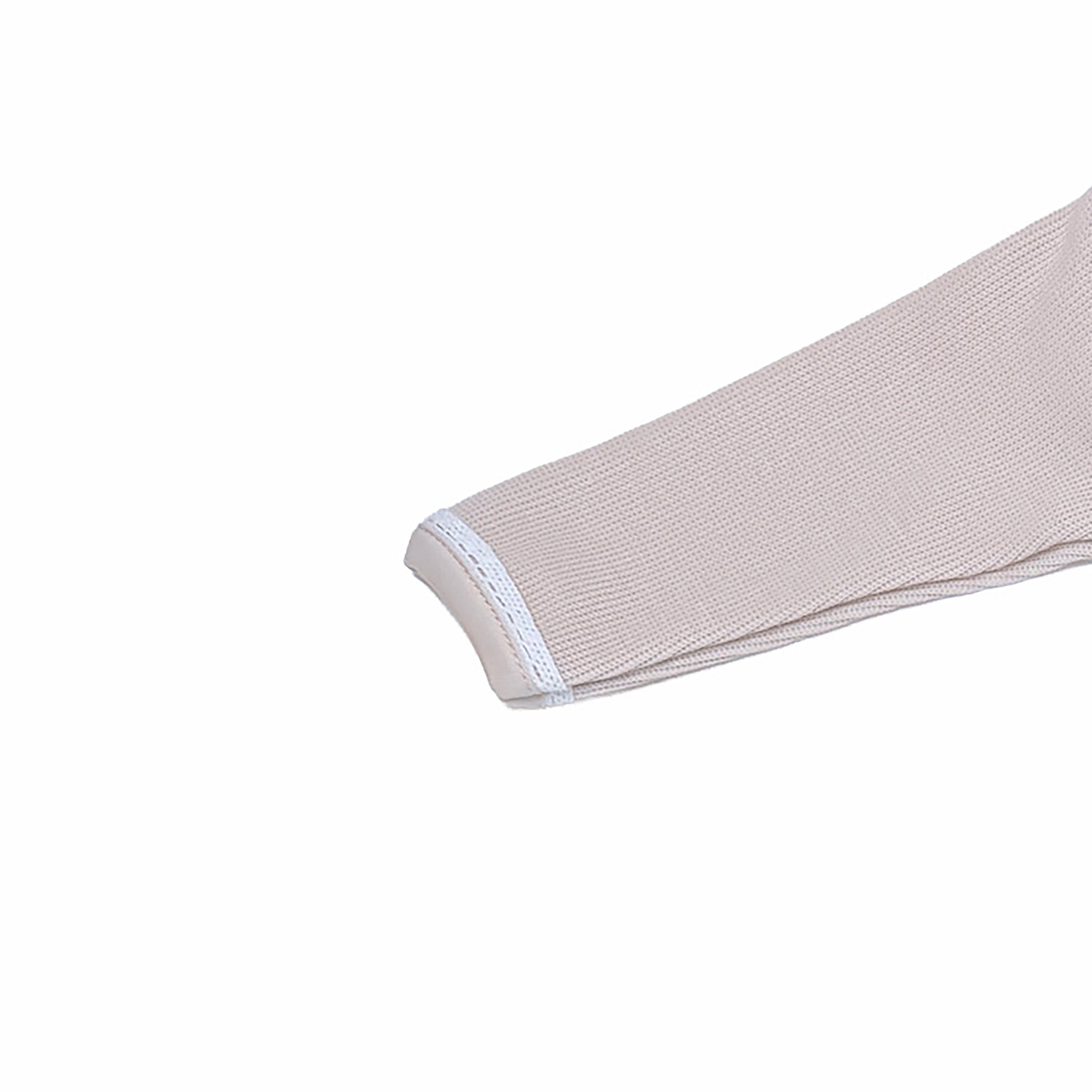 Soft textured knit fabric on Cheris Tisse Rêve Babygrow – beige.