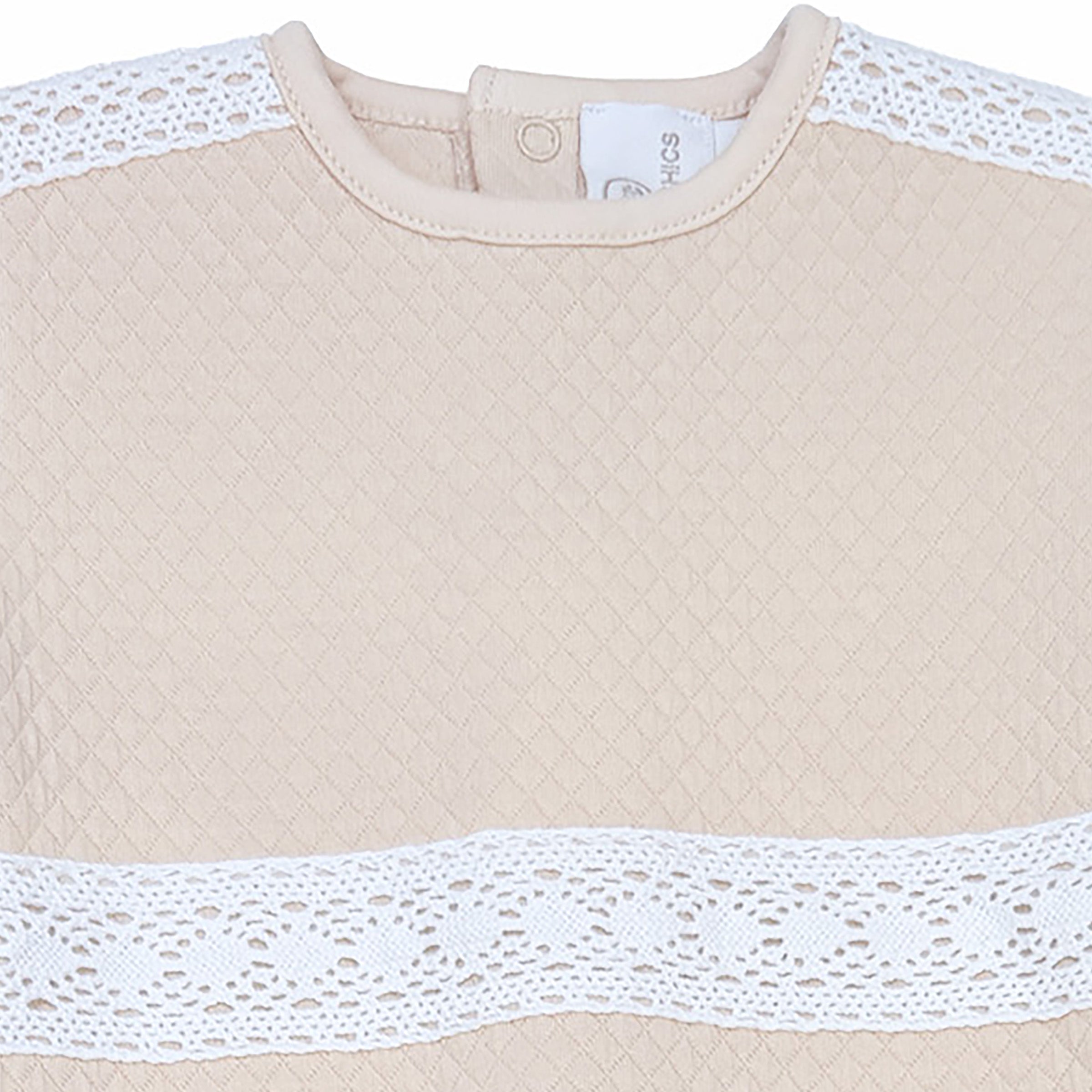 Lace-trimmed front detail on ivory quilted unisex baby sleepsuit