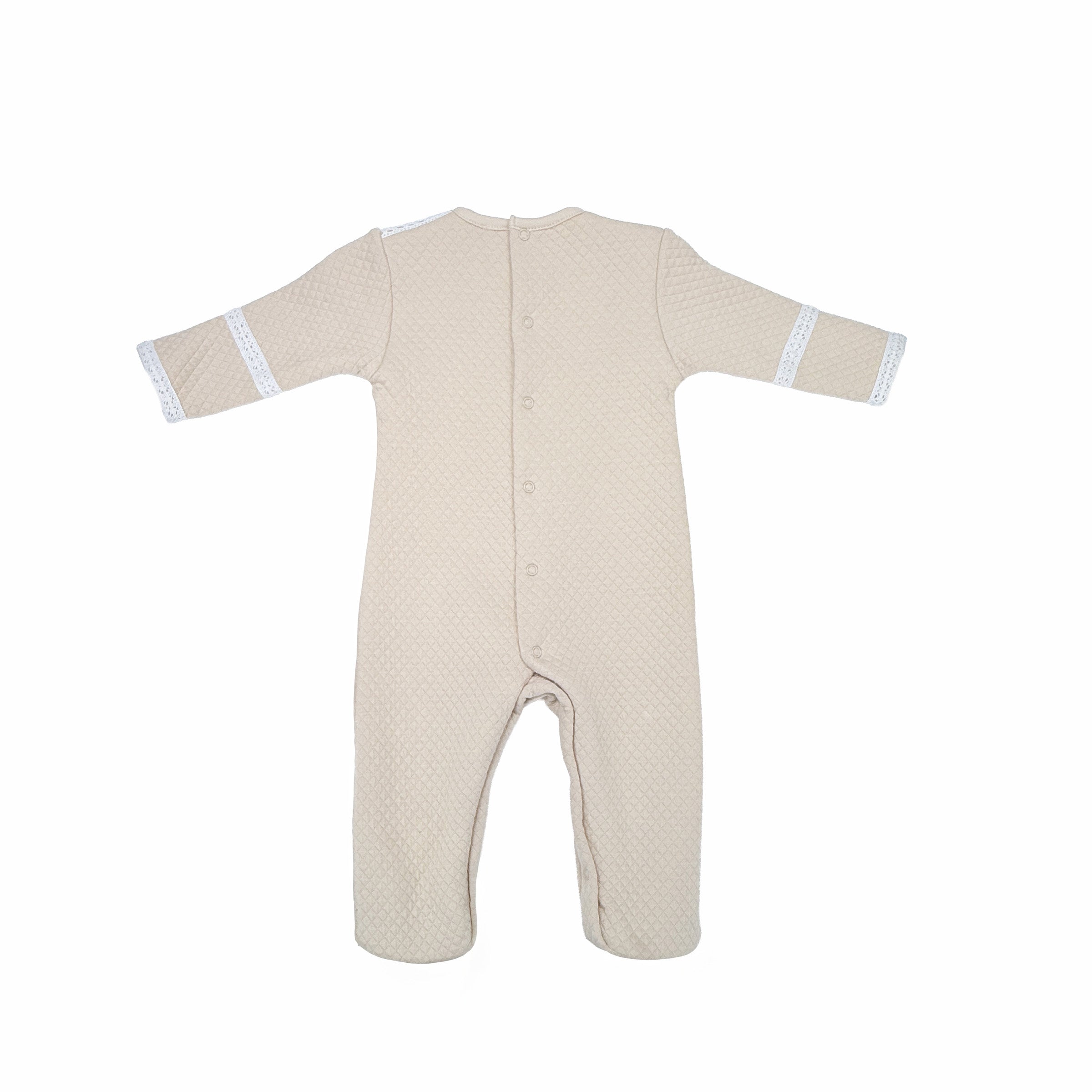 Back view of ivory quilted Élégance babygrow in luxury cotton weave.