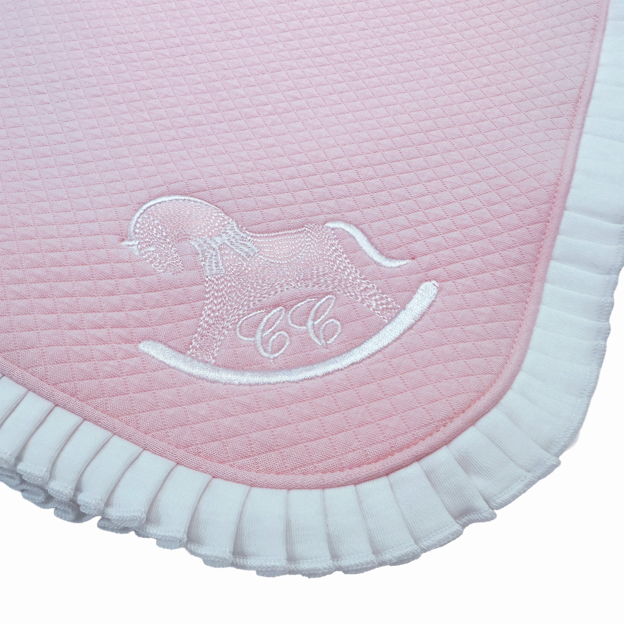 Close-up of delicate embroidery on Chéris Élégance Volants Rose Blanket.