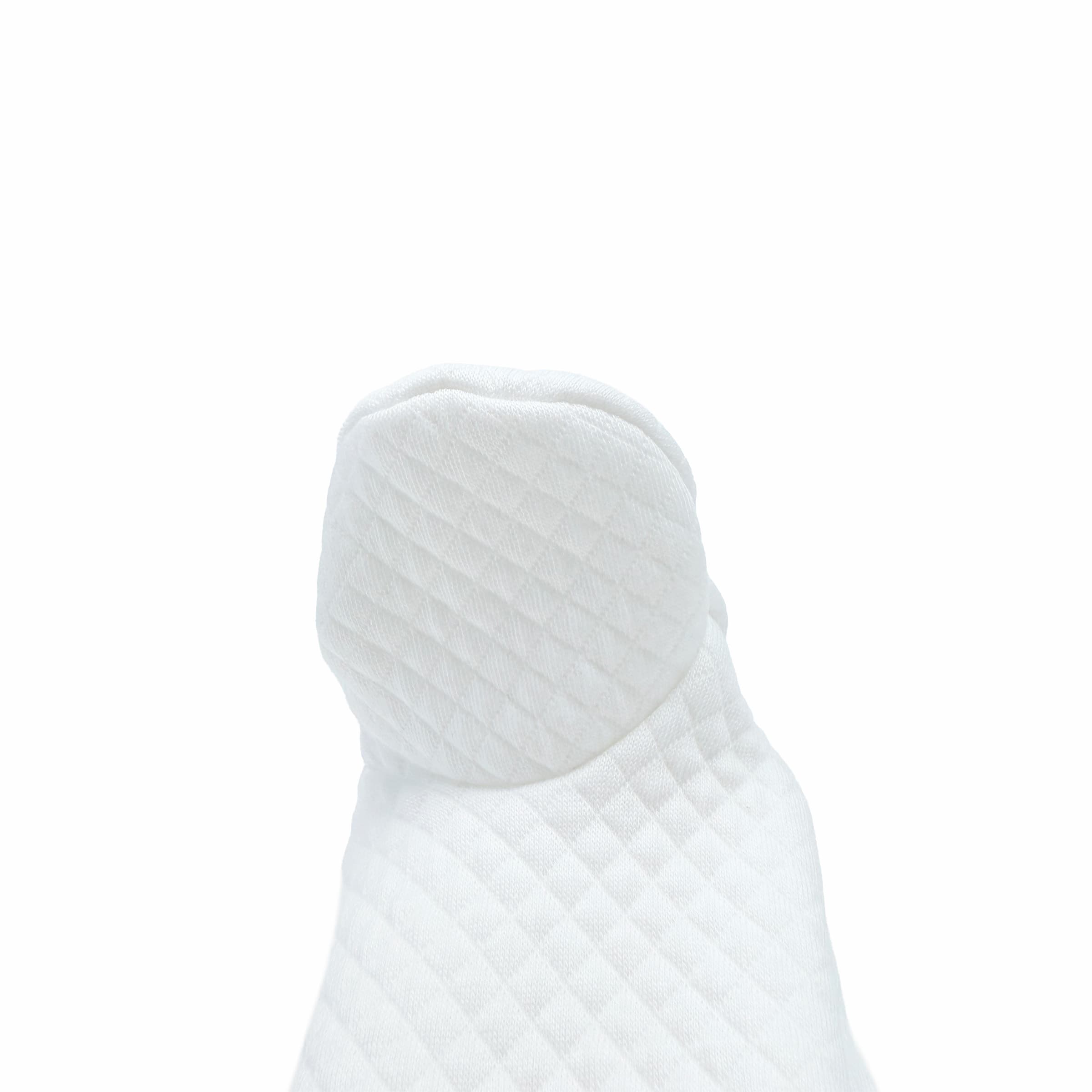 Close-up of foot on Beau babygrow.