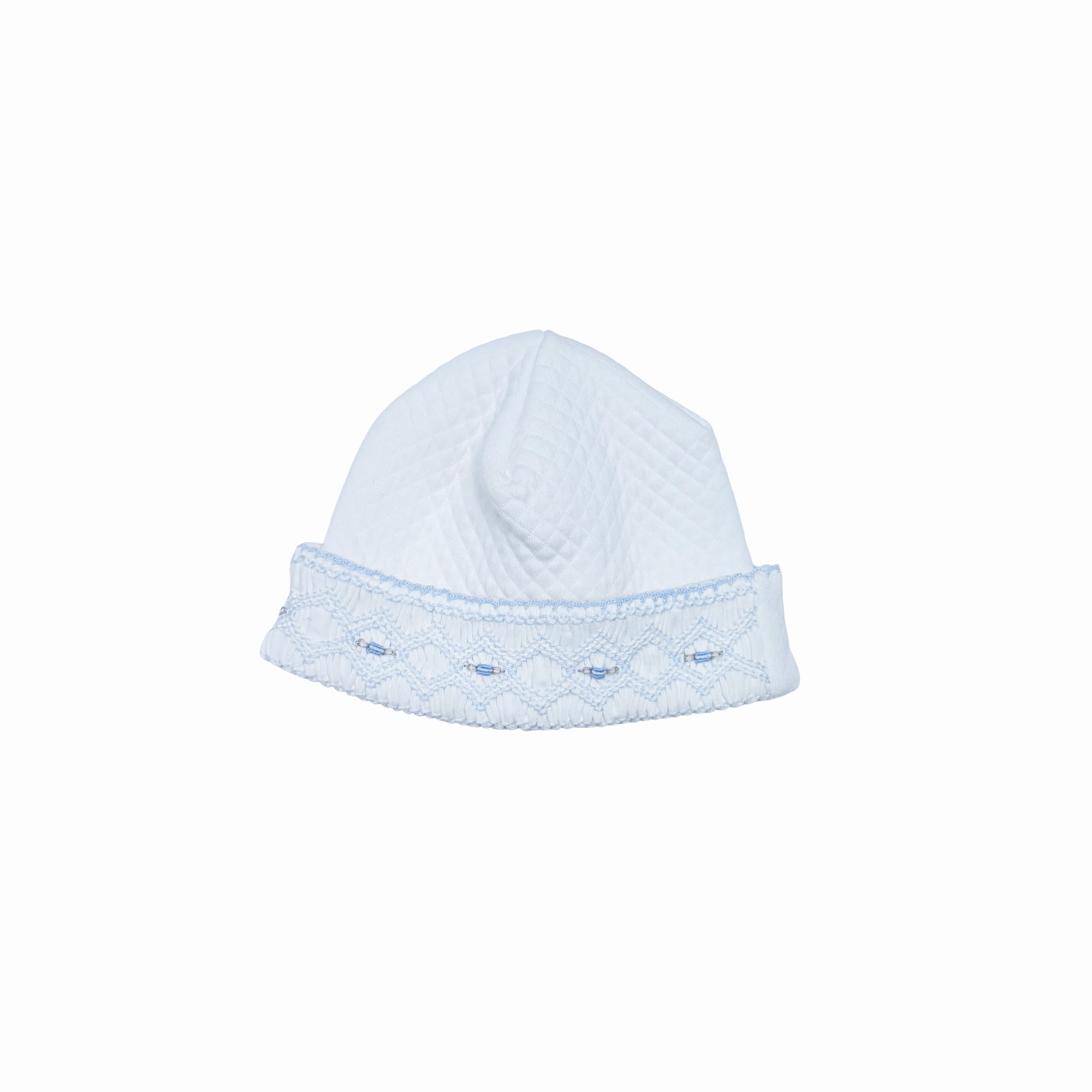 Close-up of hand-smocked stitching on luxury baby boy hat