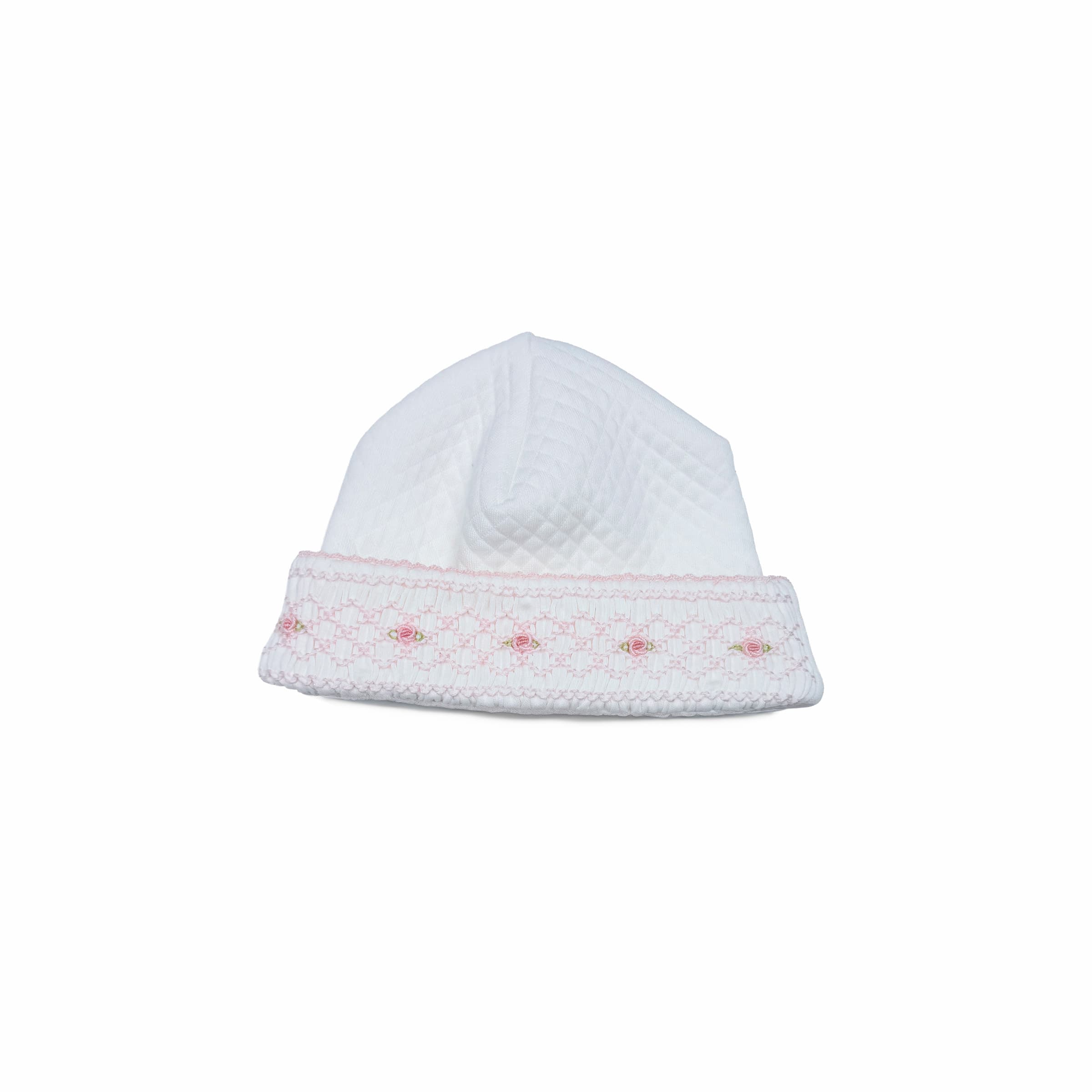 Close-up of hand-gauged smocking and rosette stitching on couture baby hat.