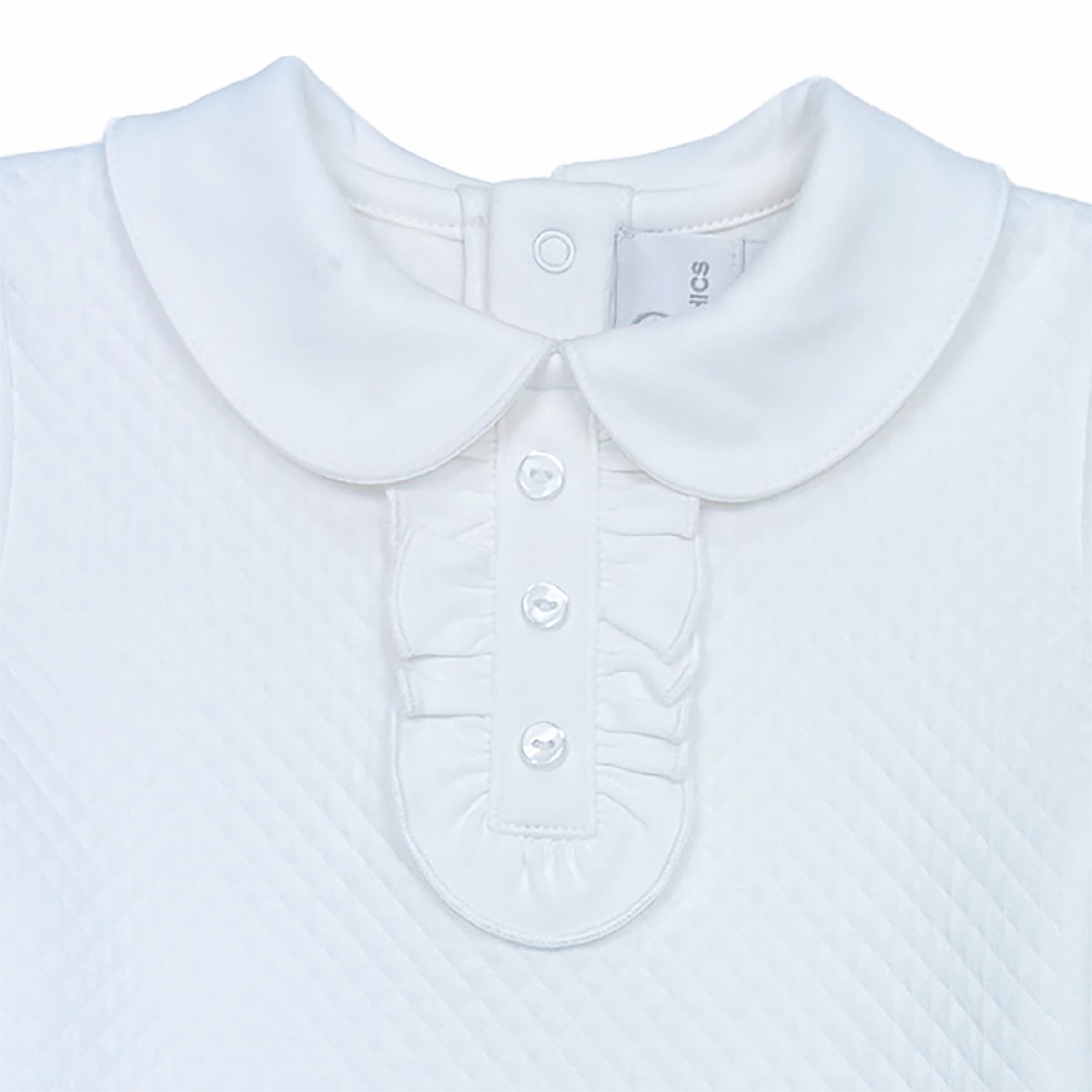 Close-up of the ruffled neckline on the Chéris Blanc Élégance Ruffled Bodysuit, highlighting delicate craftsmanship.