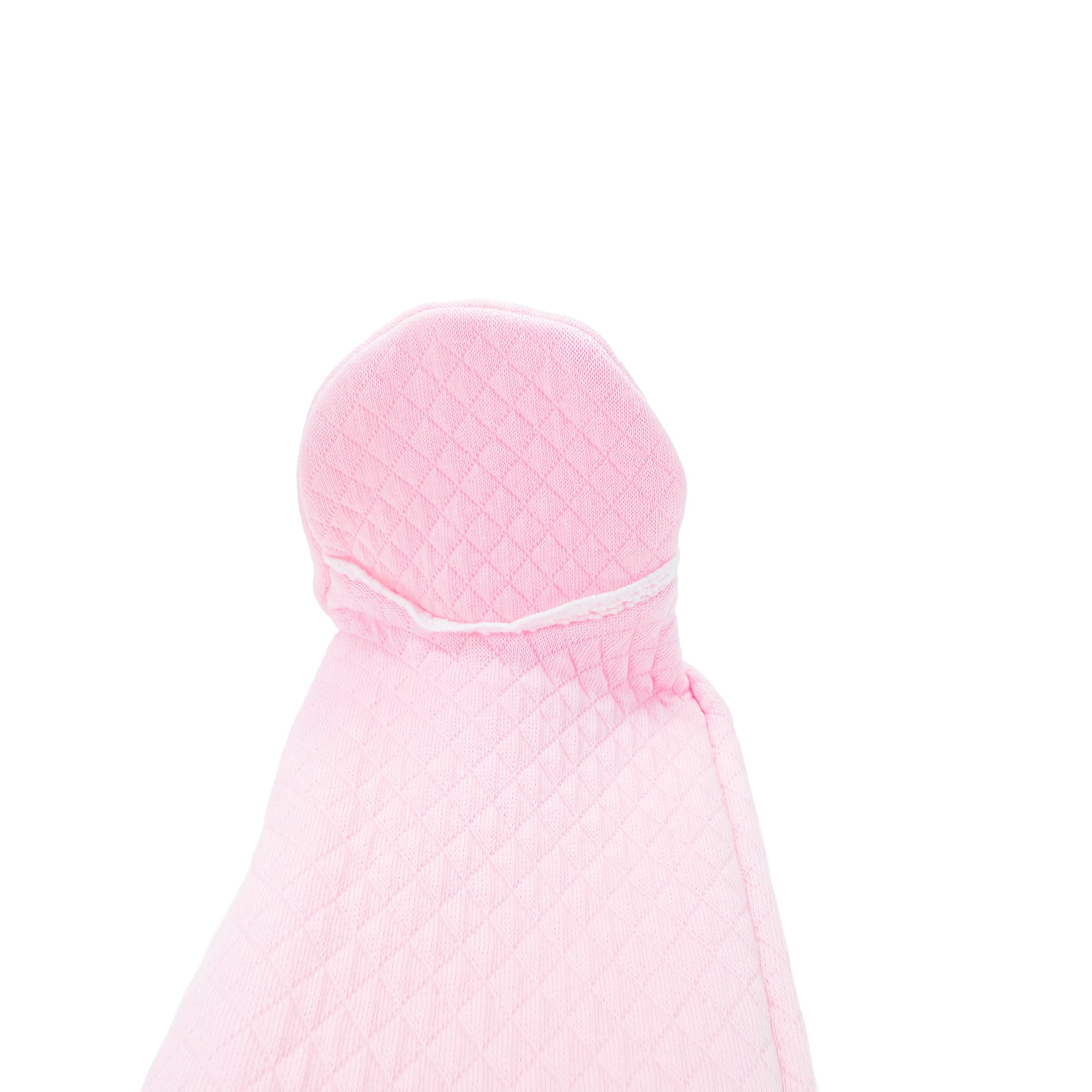Close-up of lace trim on the foot on baby girl babygrow