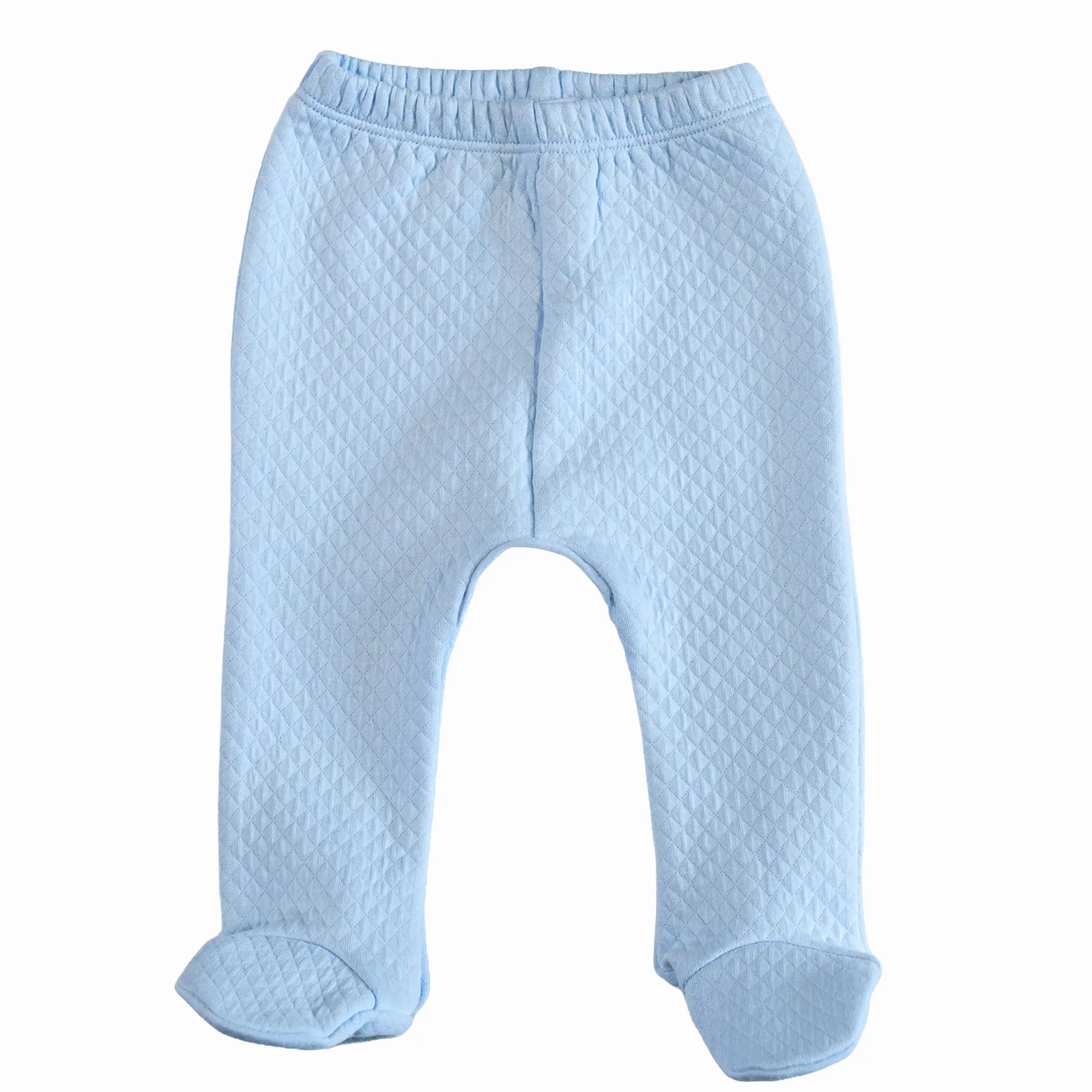 Matching blue footed baby trousers – flat lay